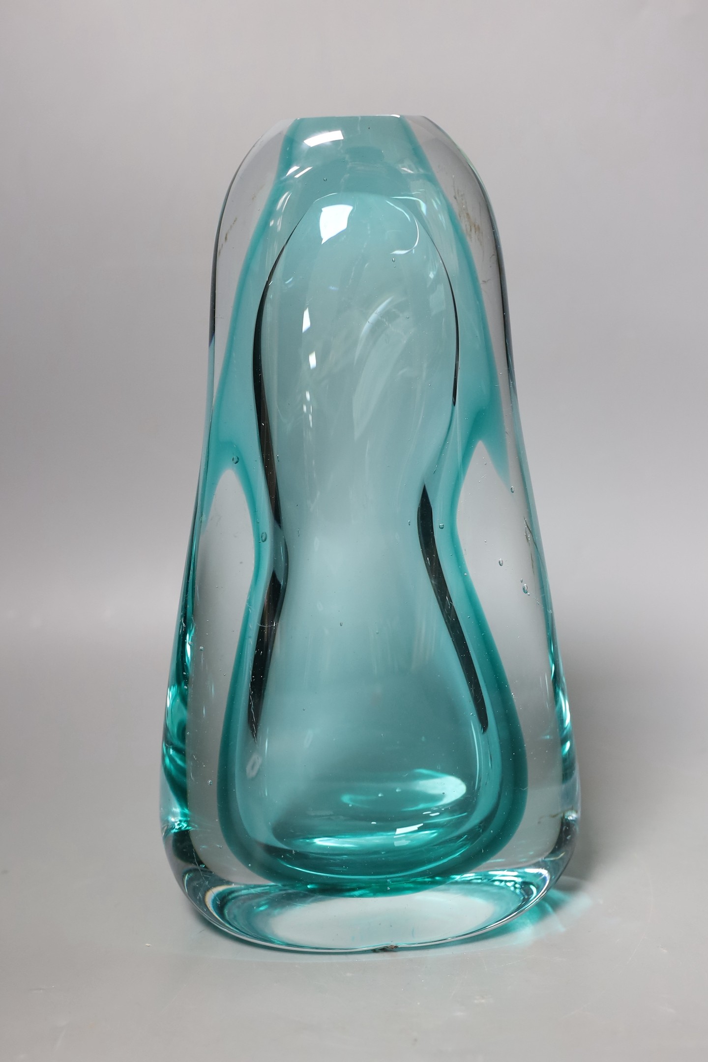 A large green glass free-form sculpture, possibly Murano, 30cms high